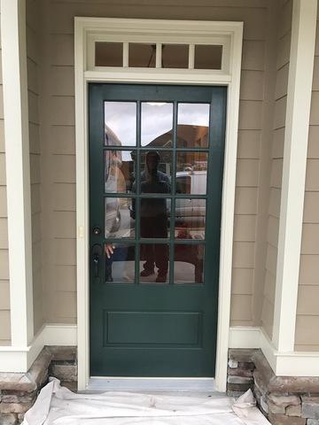 Green door on a home.
